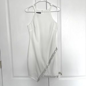 This BCX dress is a great homecoming dress with elaborate modesty and shine!